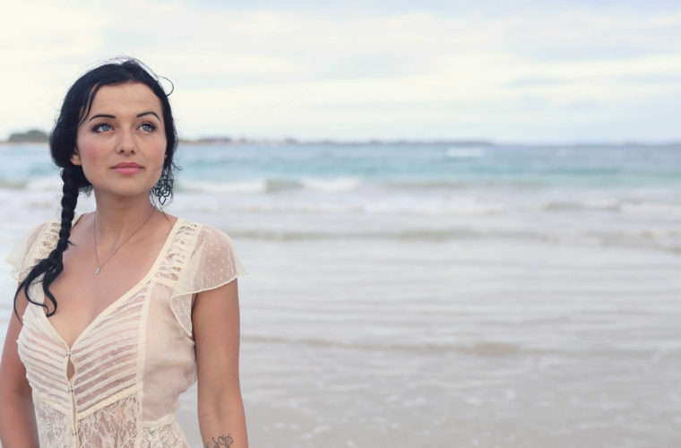 girl facing camera on beach