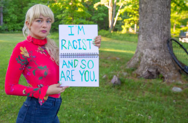 Sign Reading: "I'm Racist and So Are You."