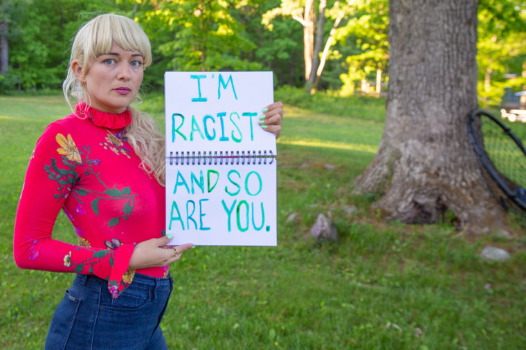 Sign Reading: "I'm Racist and So Are You."