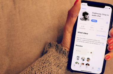 Hand Holding the Clubhouse App